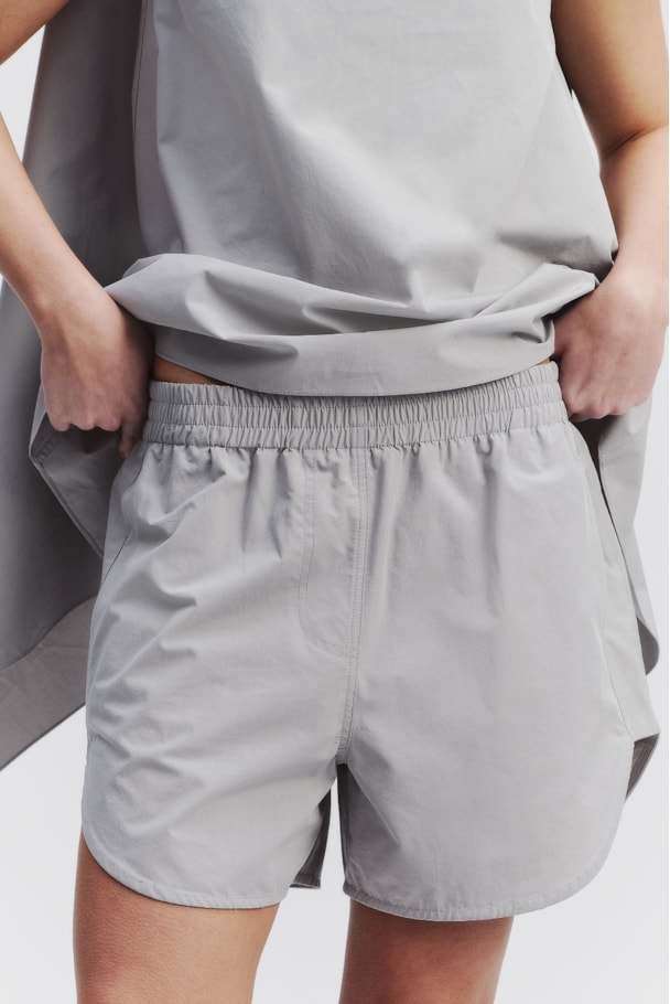 SHORTS CURVA - INOX